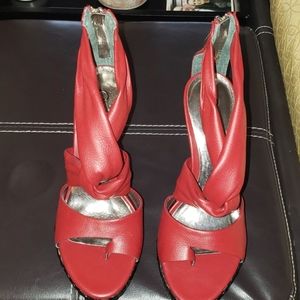Carlos Santana strappy red high heels